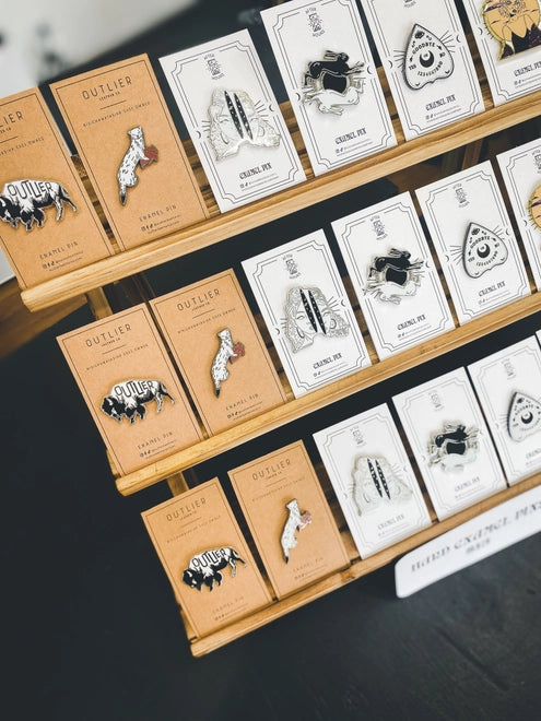 Outlier Weasel Enamel Pin