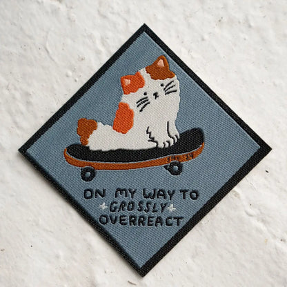 #27 Overreact Woven Sticky Patch