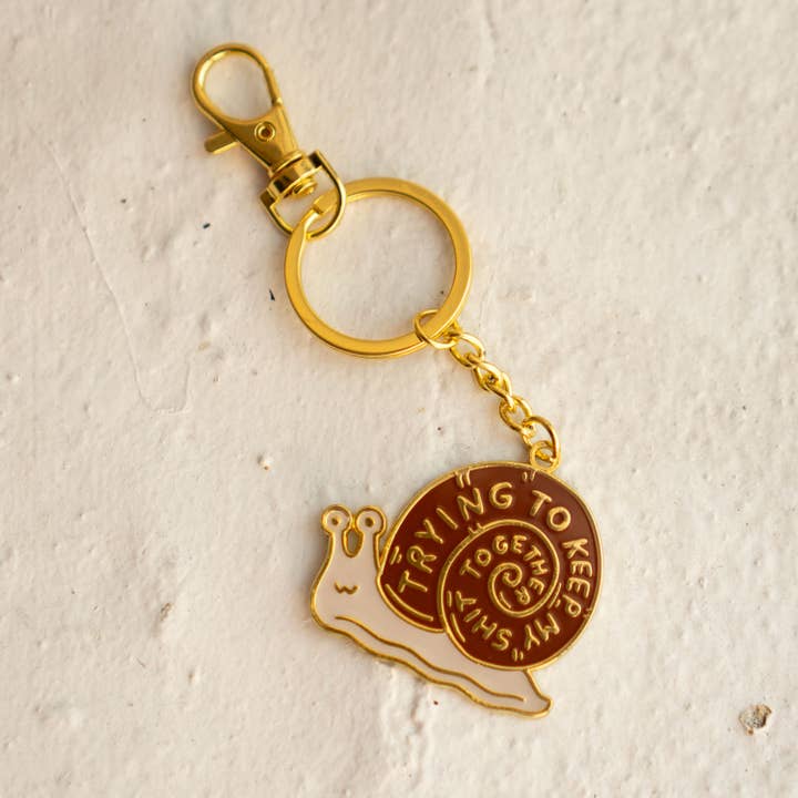 K6 Trying Snail Enamel Keychain